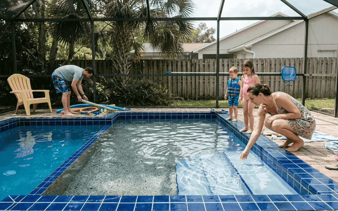 Family examining different Central Florida pool finishes