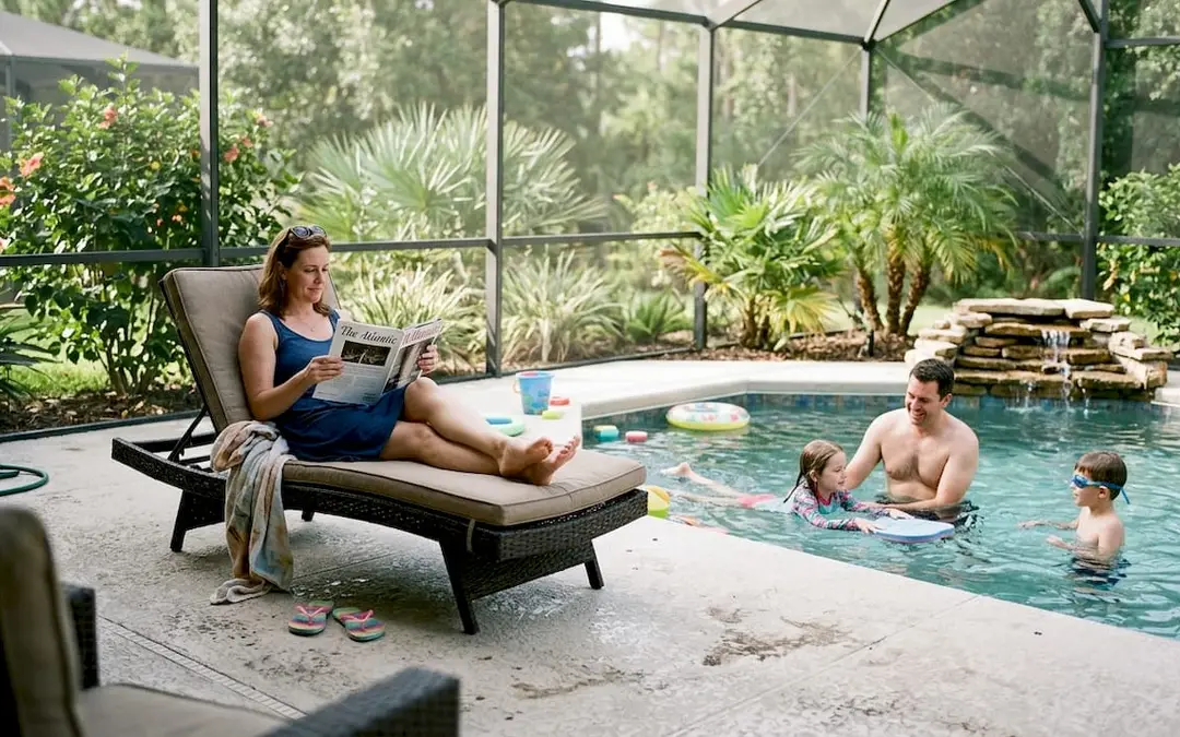 Family enjoying upgraded backyard pool